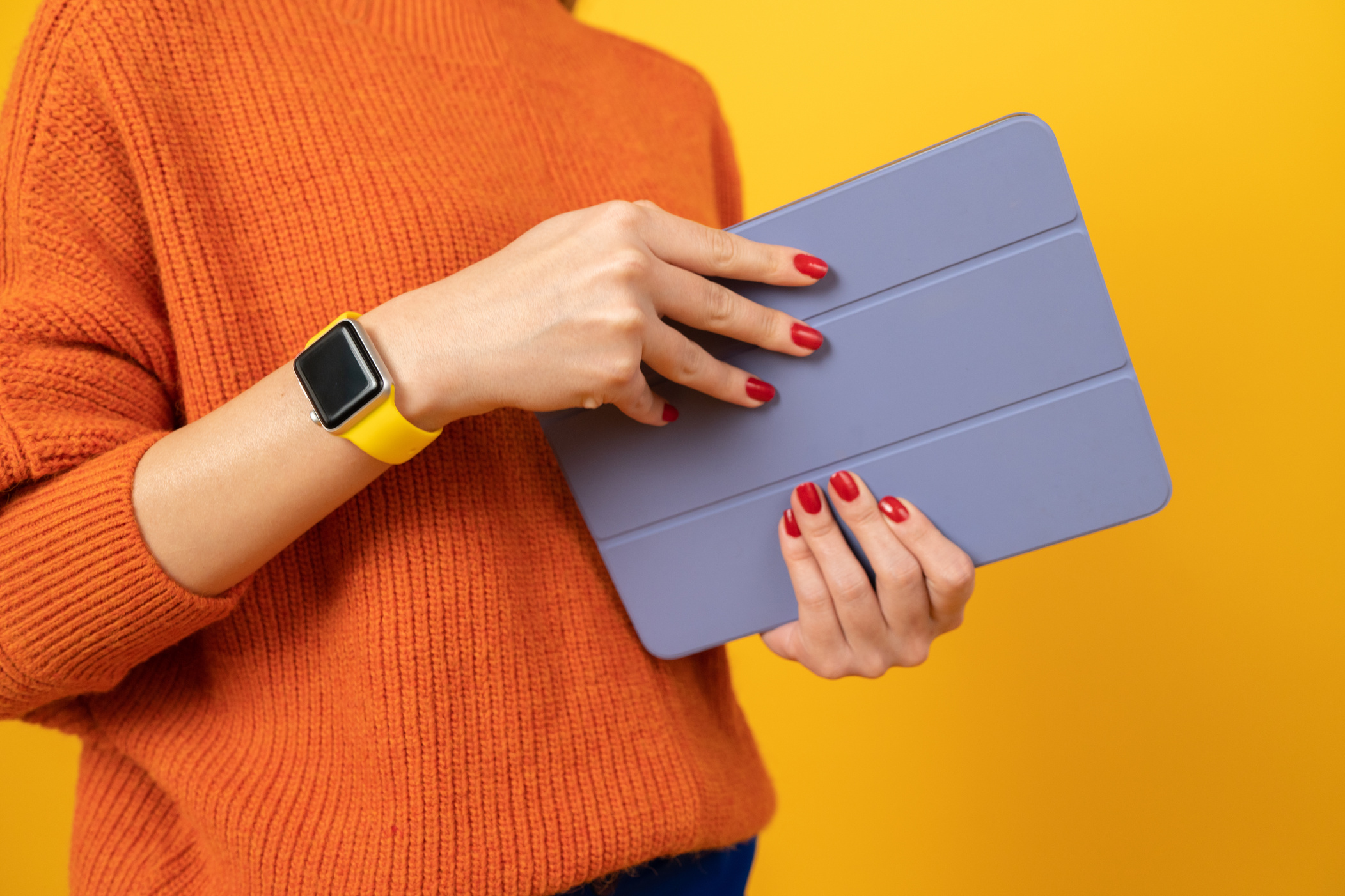 Tech Humans Person Holding Tablet and Wearing Smartwatch